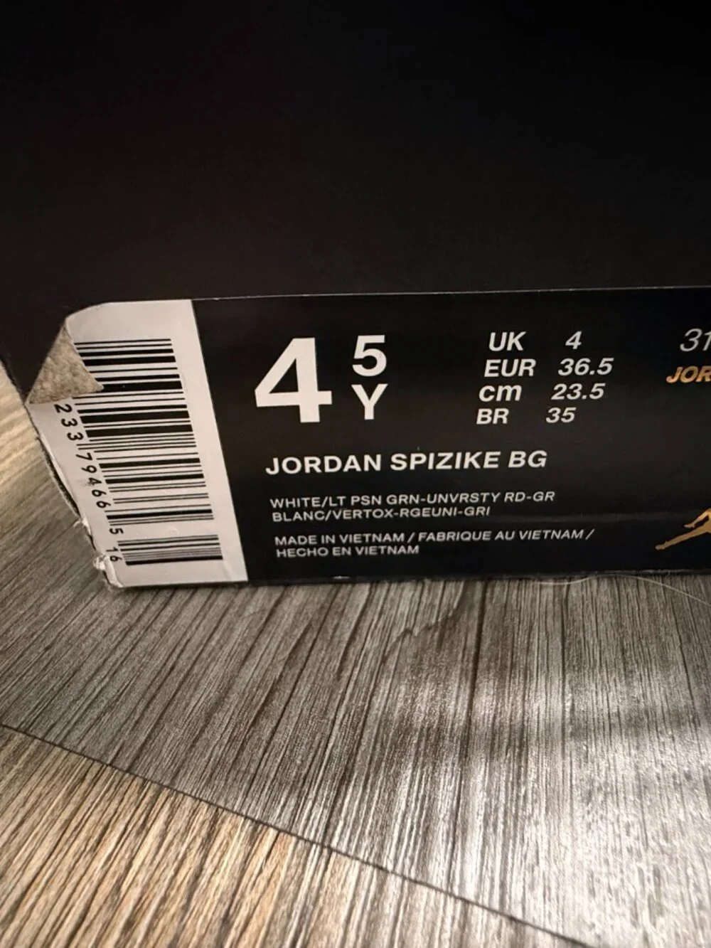 Air Jordan Spizike sneakers in white, red, and green.